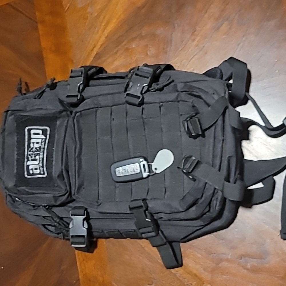 Atap Expandable tactical multi pocket backpack black.